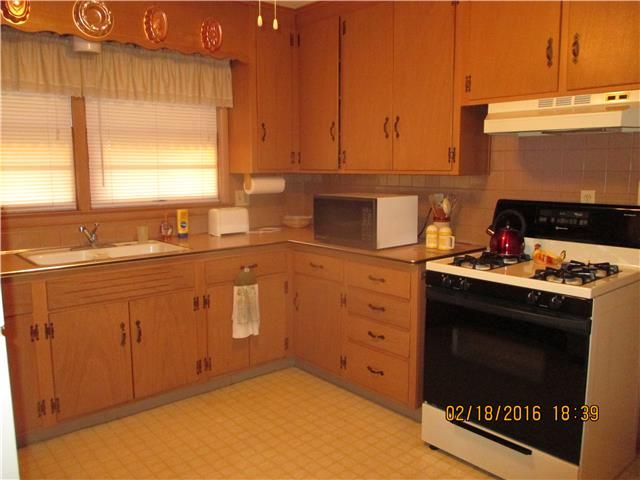 12520 13th St, Grandview, MO 64030