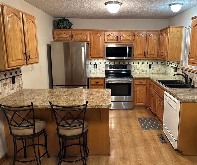 1613 W Christi Ln, Raymore, MO 64083