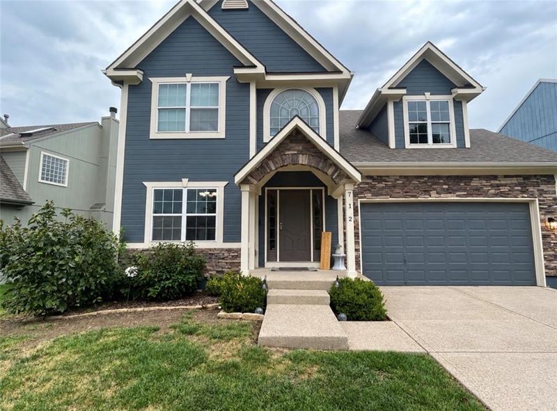 712 S Adams St, Raymore, MO 64083
