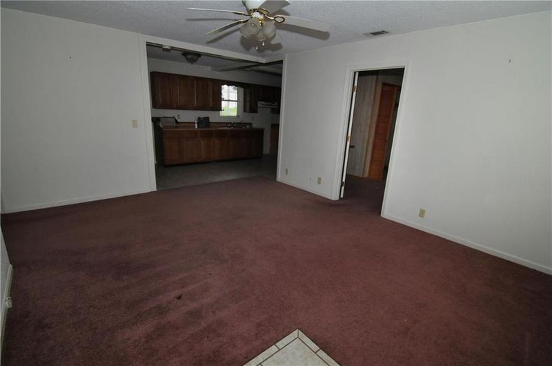106 E Pine St, Drexel, MO 64742