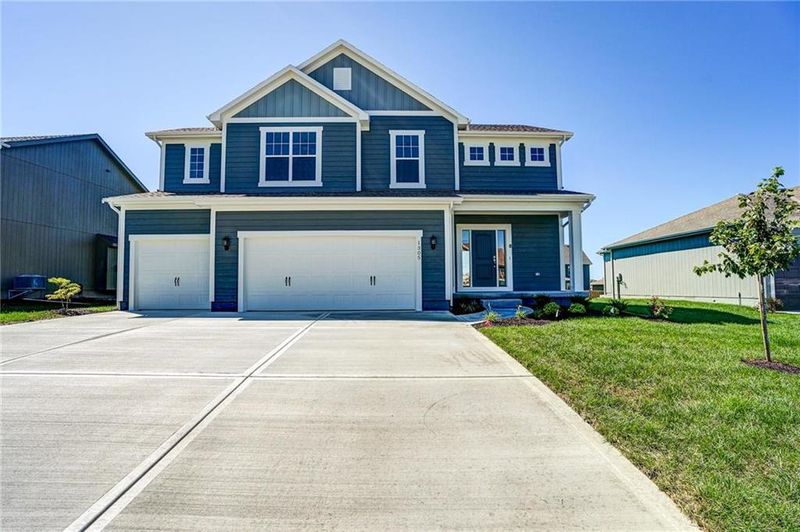 1305 Mission Dr, Raymore, MO 64083