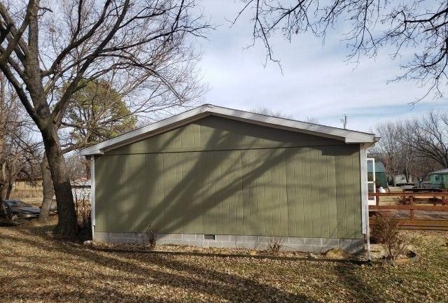 310 S 6th St, Deepwater, MO 64740