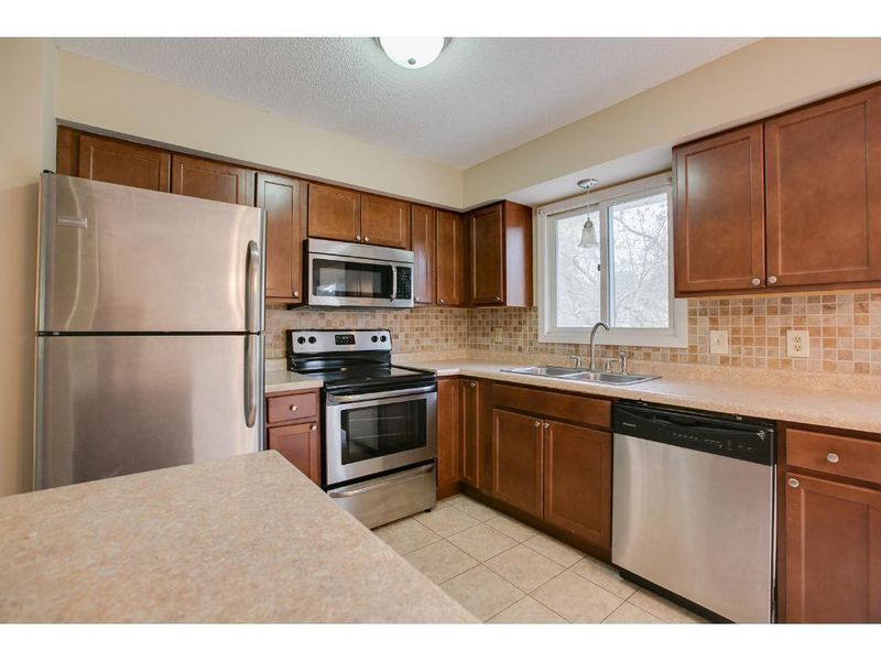1909 Gunflint Trl, Brooklyn Park, MN 55444