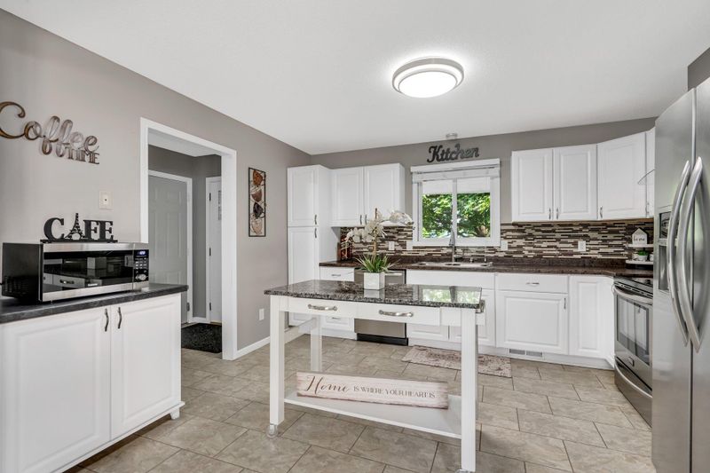 709 Meadowwood Dr, Brooklyn Park, MN 55444