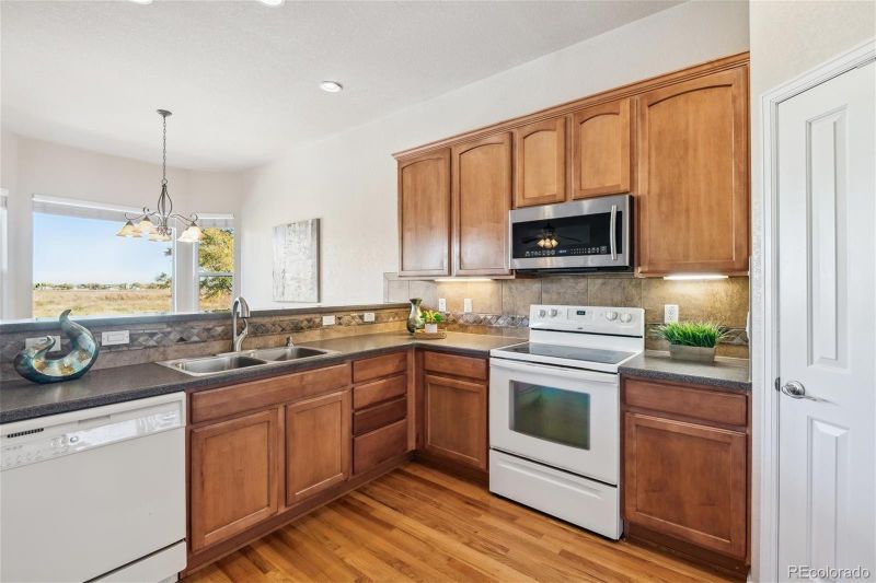 1603 Red Poppy Dr, Brighton, CO 80601