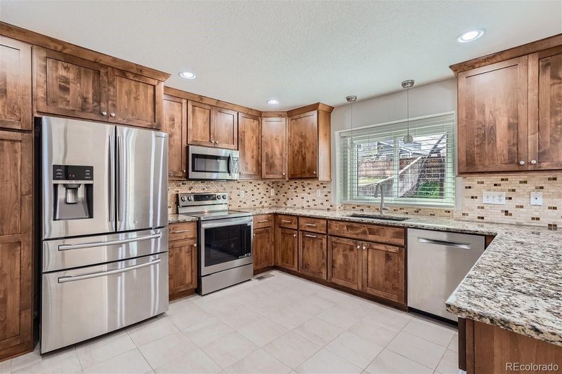 10034 Strathfield Ln, Highlands Ranch, CO 80126
