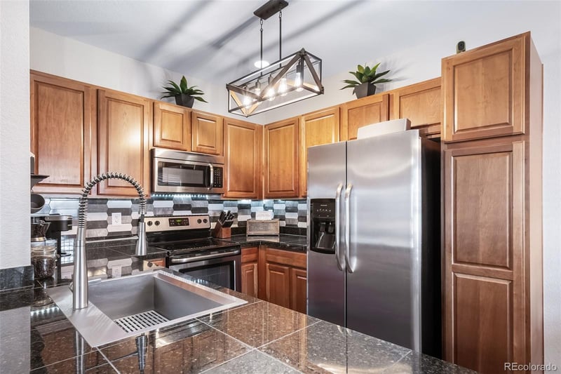 9511 Pearl Cir #104, Parker, CO 80134