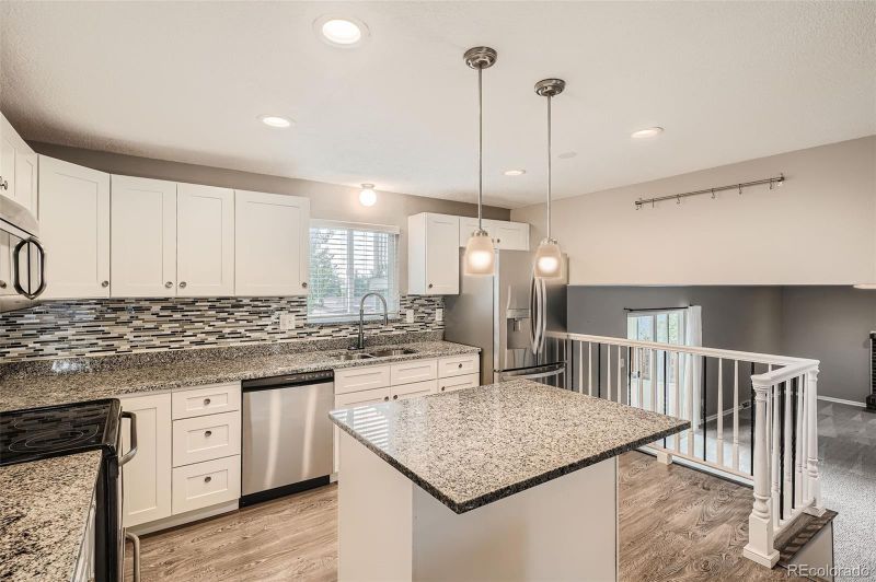 9014 W Harvard Dr, Lakewood, CO 80227