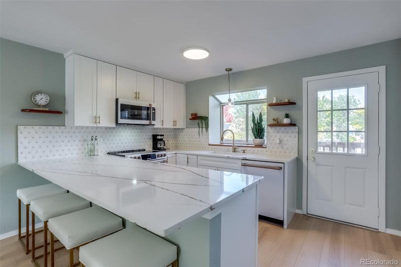 9689 W Chatfield Ave #E, Littleton, CO 80128