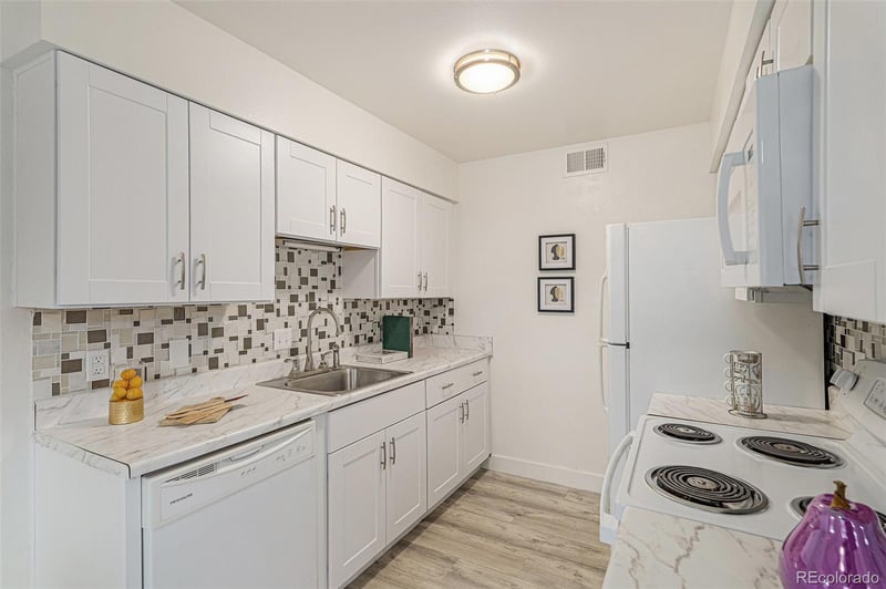 3141 S Tamarac Dr #101F, Denver, CO 80231