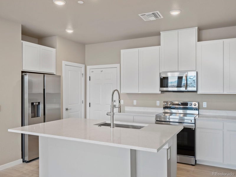 6153 N Ceylon St #102, Denver, CO 80249