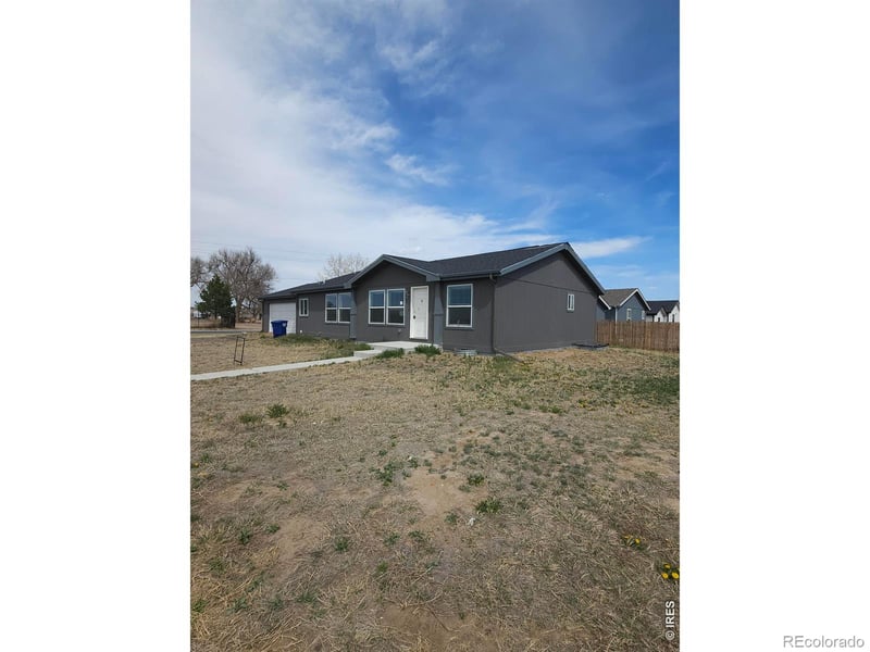 113 Juniper Cir, Log Lane Village, CO 80705