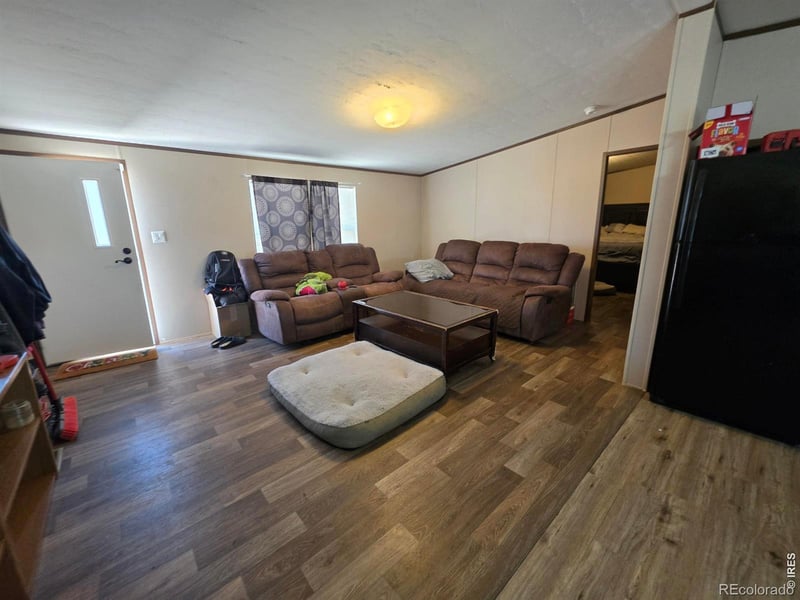 209 Larch Dr, Log Lane Village, CO 80705