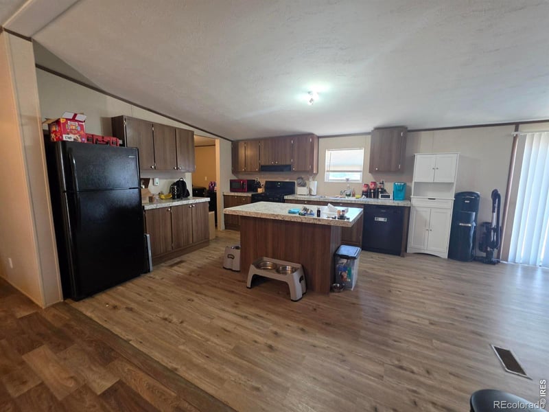 209 Larch Dr, Log Lane Village, CO 80705