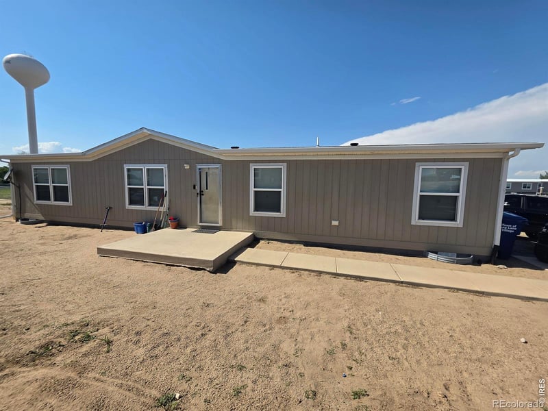209 Larch Dr, Log Lane Village, CO 80705
