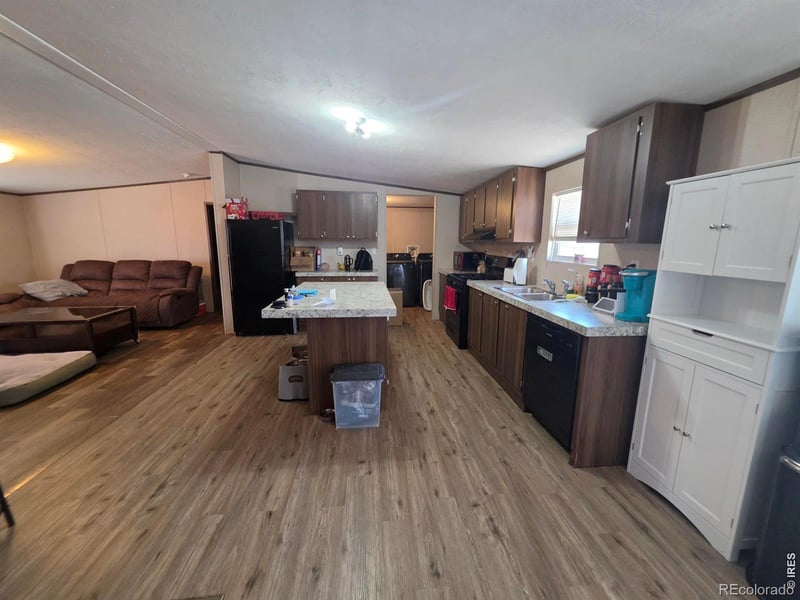 209 Larch Dr, Log Lane Village, CO 80705