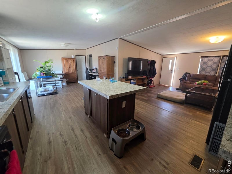 209 Larch Dr, Log Lane Village, CO 80705