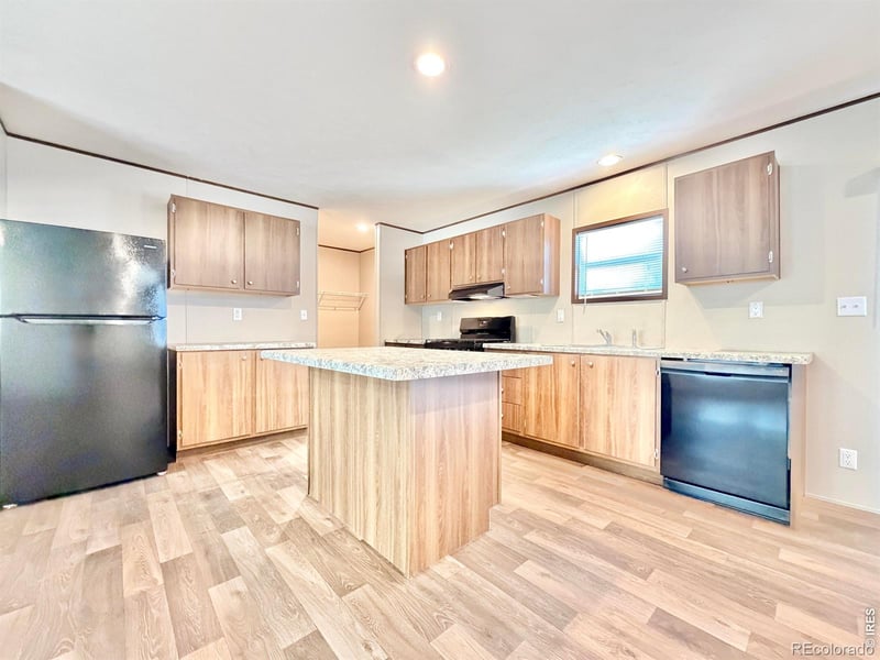103 Beach Dr, Log Lane Village, CO 80705