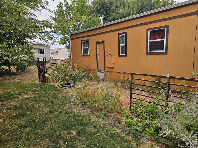 227 Balsam St, Log Lane Village, CO 80705