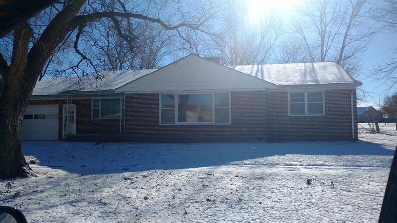 210 E 3rd St, Russell, KS 67665