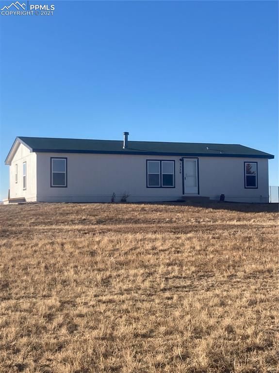 3320 Hoofbeat Rd, Falcon, CO 80831
