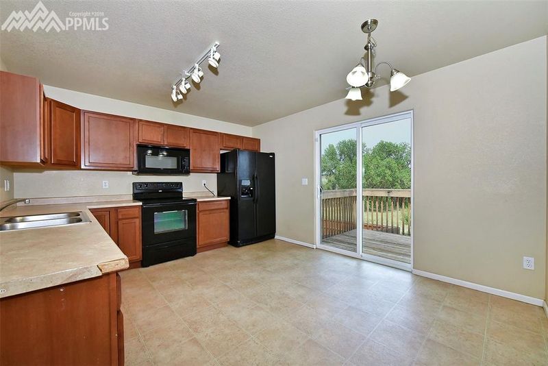 77 N Audubon Dr, Colorado Springs, CO 80910