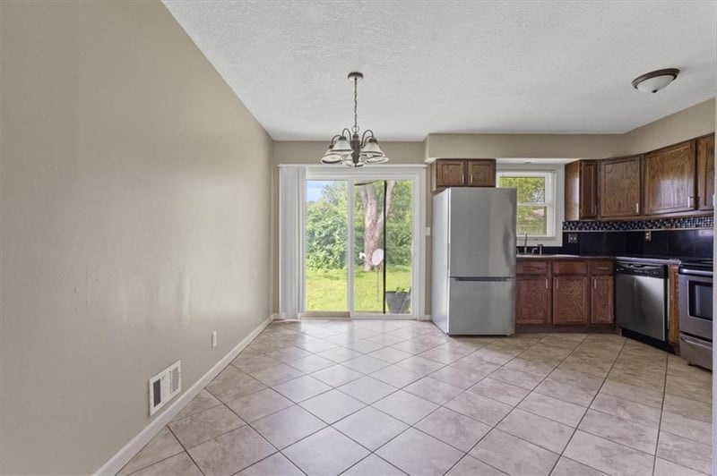 8818 James A Reed Rd, Kansas City, MO 64138