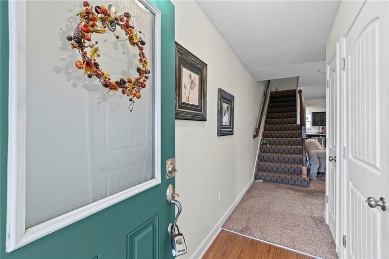 221 Pointe Ln, Raymore, MO 64083