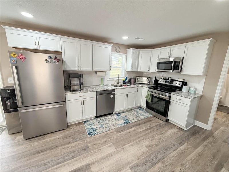 210 Franklin St, Raymore, MO 64083