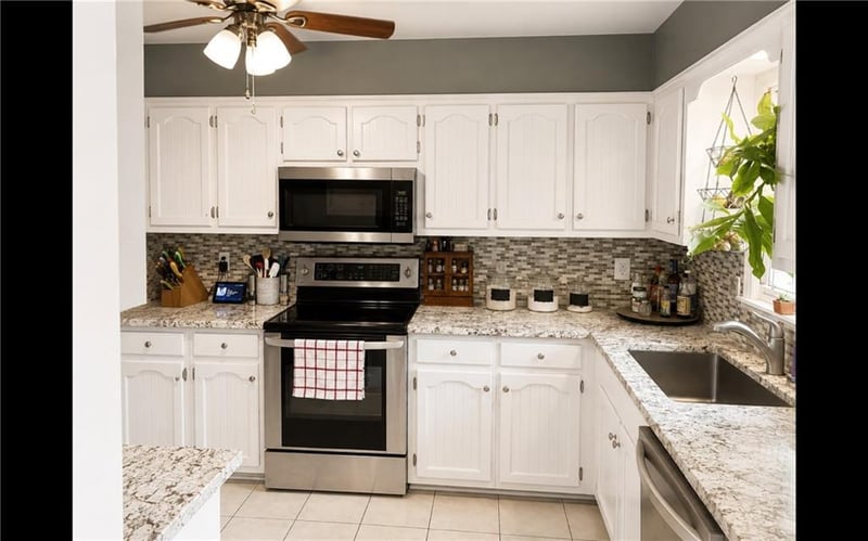 506 Monroe St, Raymore, MO 64083