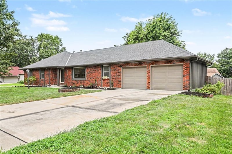 300 Woodson Dr, Raymore, MO 64083