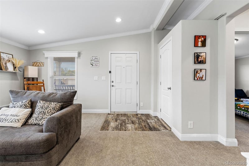 104 Juniper Cir, Log Lane Village, CO 80705