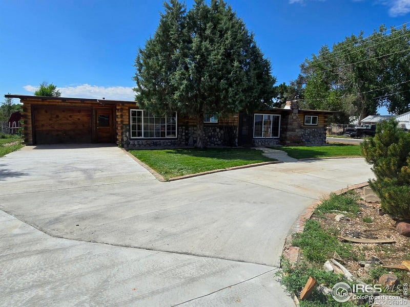 119 Cedar St, Log Lane Village, CO 80705