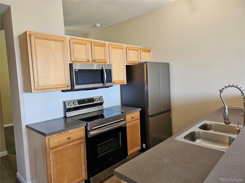 15475 E Andrews Dr #402, Denver, CO 80239