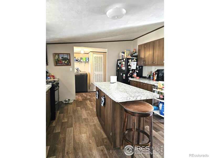 219 Larch Dr, Log Lane Village, CO 80705