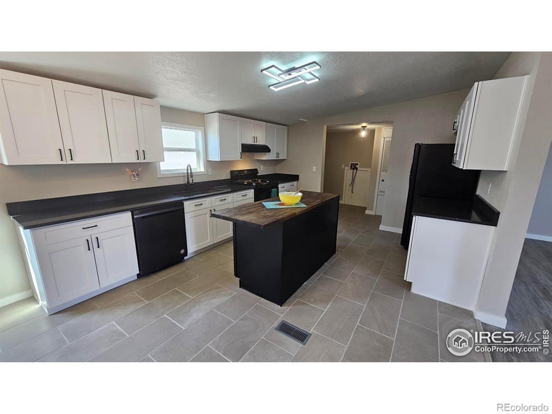 204 Linden Dr, Log Lane Village, CO 80705