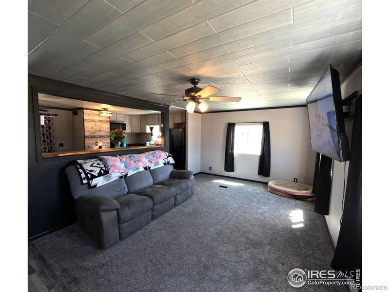 218 Crest Dr, Log Lane Village, CO 80705