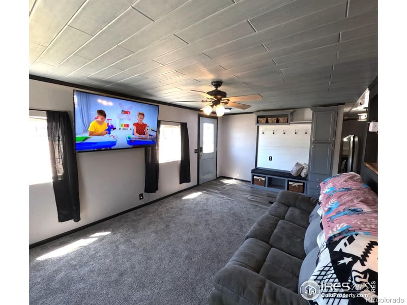 218 Crest Dr, Log Lane Village, CO 80705