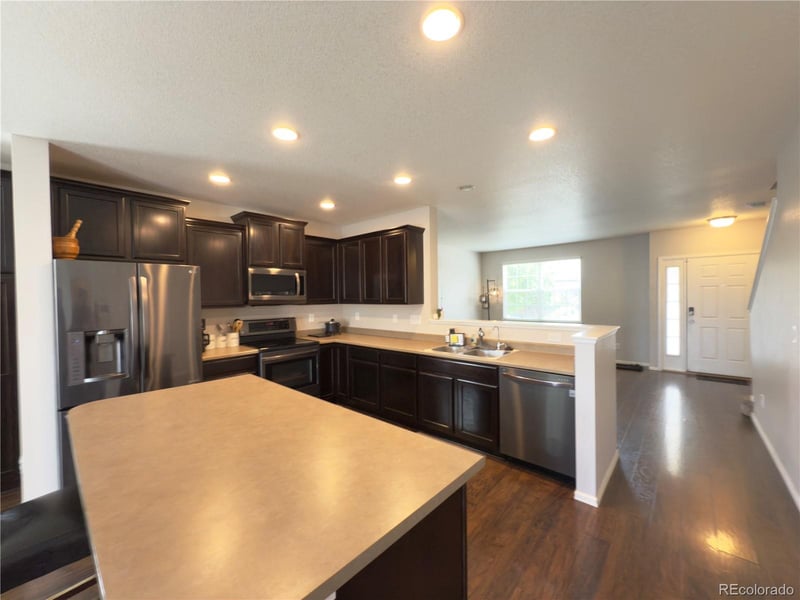 11590 River Oaks Ln, Commerce, CO 80640