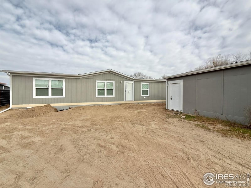 220 Crest Dr, Log Lane Village, CO 80705