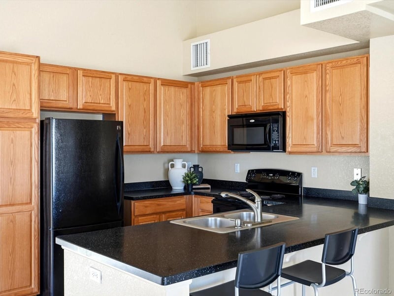 9585 Pearl Cir #203, Parker, CO 80134