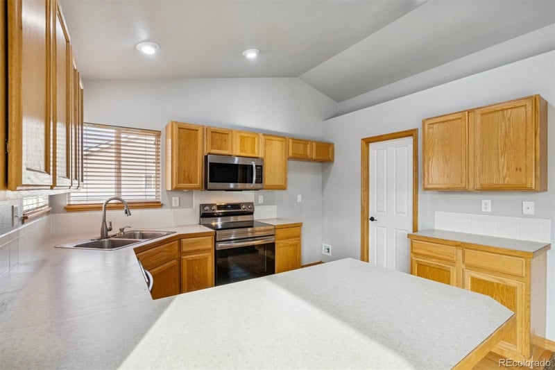 8733 Flaming Arrow Ave, Wellington, CO 80549