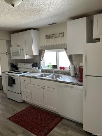 3154 Longfellow Pl, Denver, CO 80221