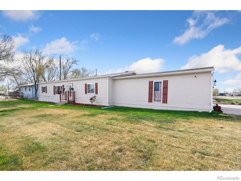 110 Ash St, Log Lane Village, CO 80705