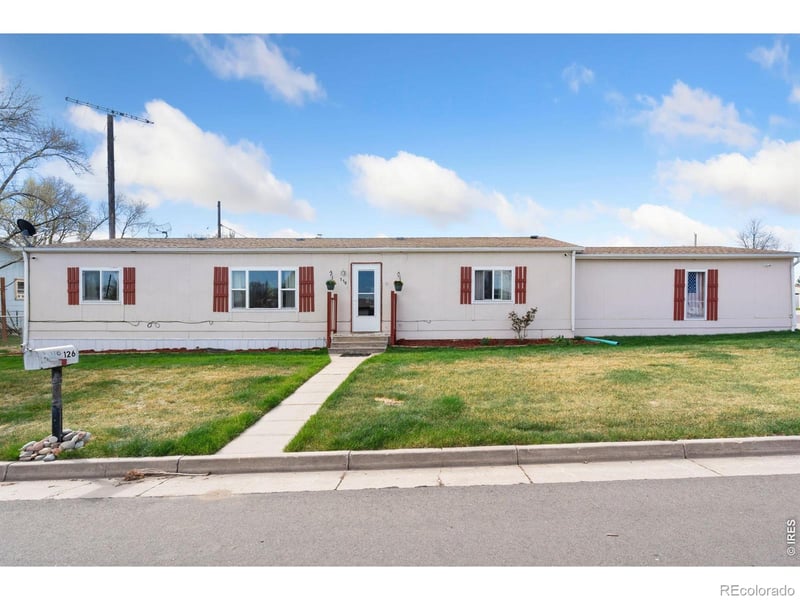 110 Ash St, Log Lane Village, CO 80705