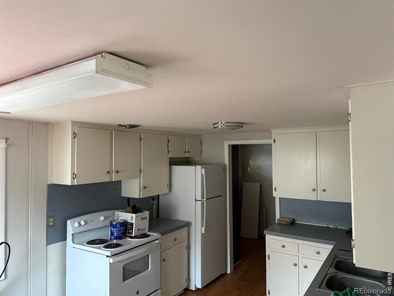 119 Pine St, Log Lane Village, CO 80705