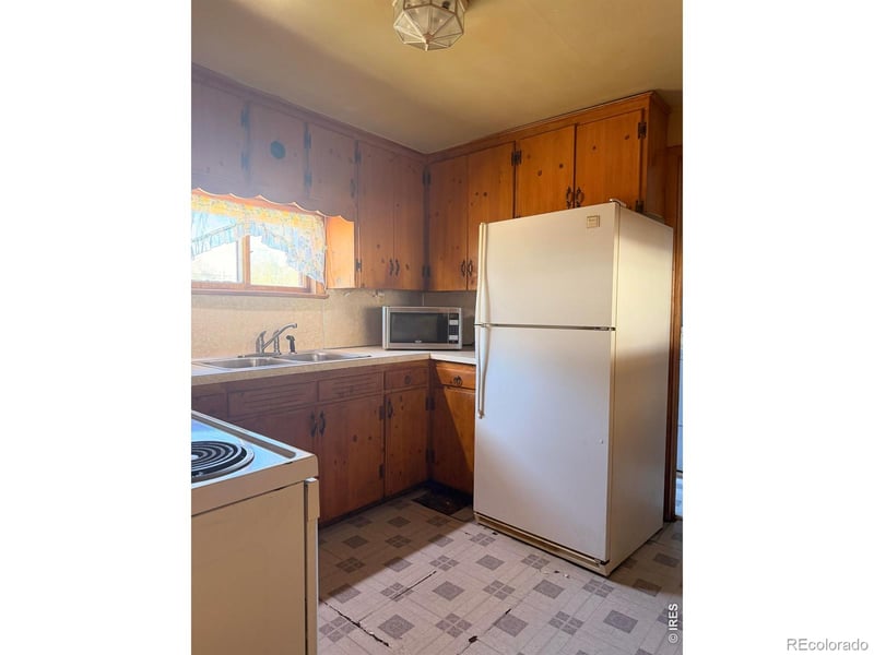 117 Pine St, Log Lane Village, CO 80705