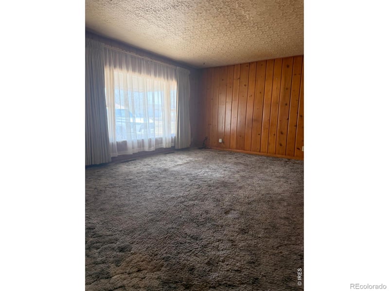 117 Pine St, Log Lane Village, CO 80705