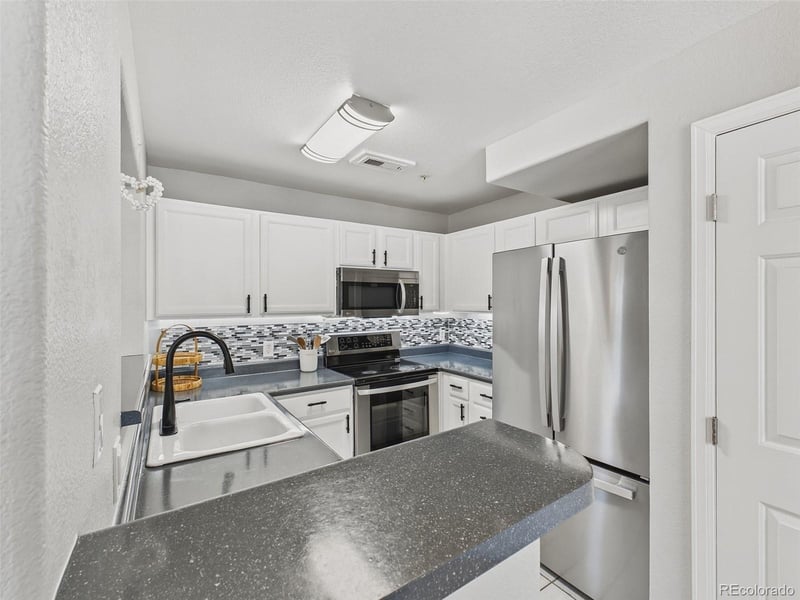 14296 Whitaker Pl #111, Aurora, CO 80015