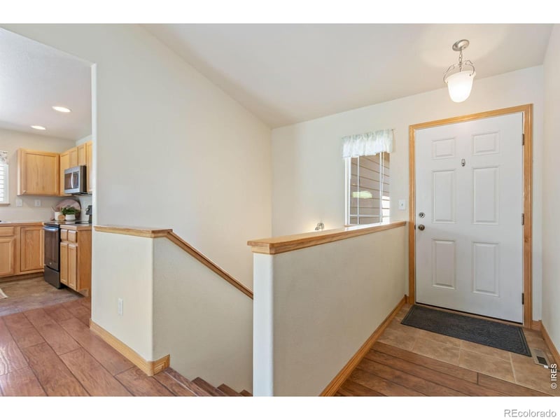 8781 Flaming Arrow Ave, Wellington, CO 80549